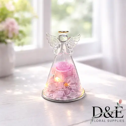 LED Angel Eternity Pink Rose Pink preserved rose with LED lights displayed inside an angel glass bottle