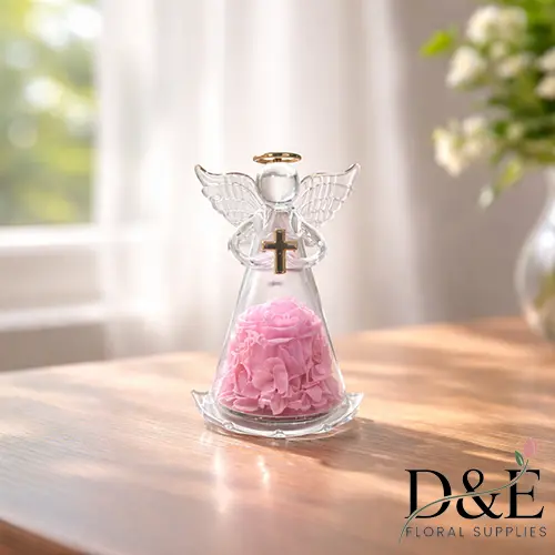 Mini Cross Angel Eternity Pink Rose Mini pink preserved flower displayed inside an angel glass bottle
